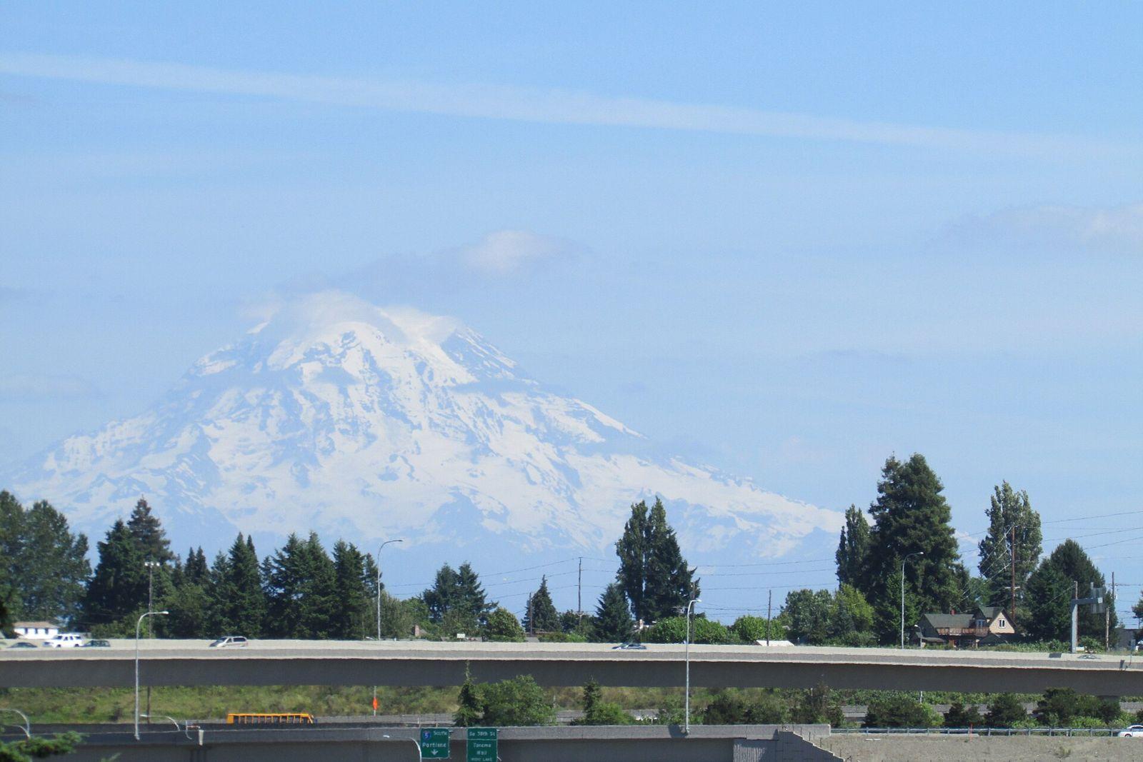 Mount Rainier under a blue sky, seen from the City Hall patio in Puyallup